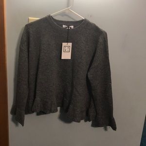 Brand new with tags boutique sweater. Size small